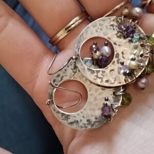 Silver Earrings with Circular Design and Purple Gemstones